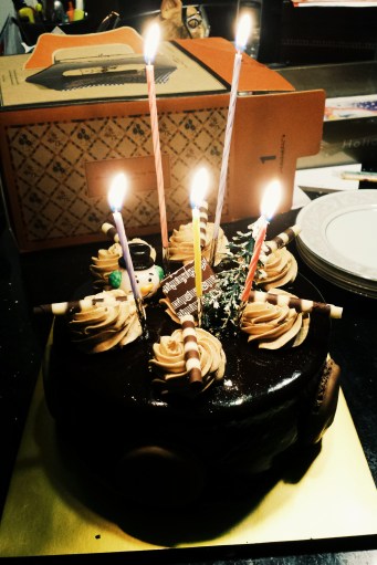 Chocolate cake!!! With a snowman and a tree on it. (They weren't edible...)